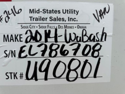 Mid-States Utility Trailer Sales label on a Wabash trailer showing VIN, stock number, and S/N handwritten. Text includes MAKE 2014 Wabash, S/N EL786708, STK # U90801, and stock tag details.