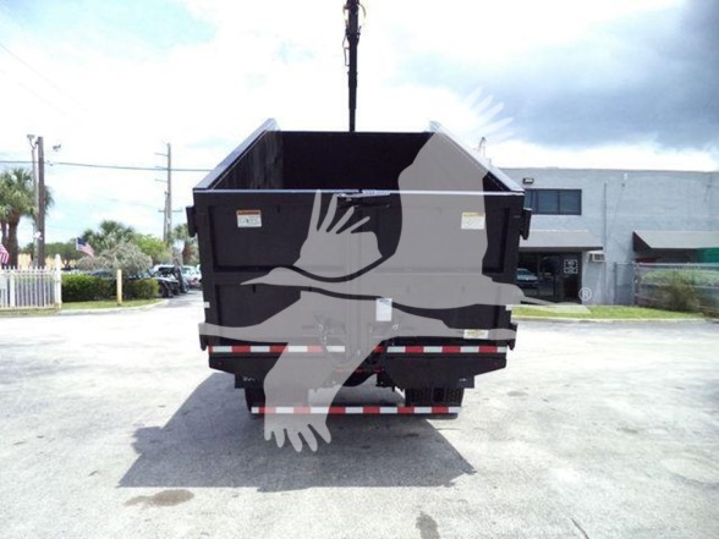 Dump truck bed showing back view with hopper and grapple equipment, International Durastar 2019 model, stock number T83650, VIN 3HAMMMML7KL383650.
