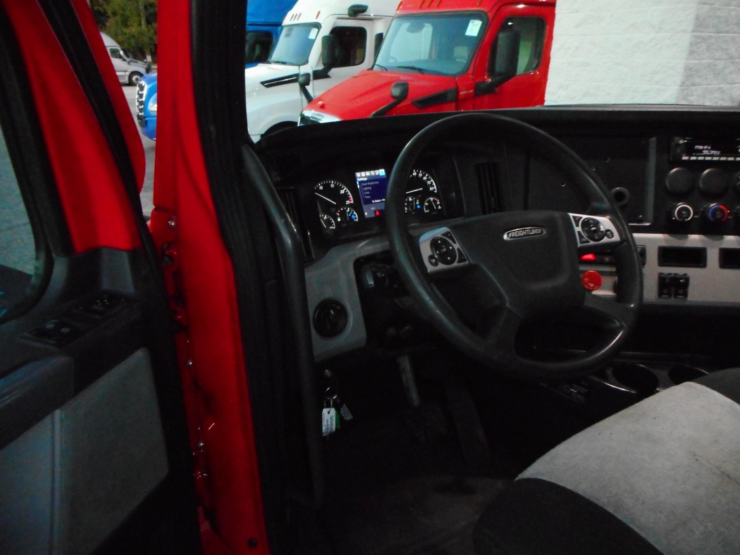 Freightliner Cascadia 116 interior dash and steering wheel view