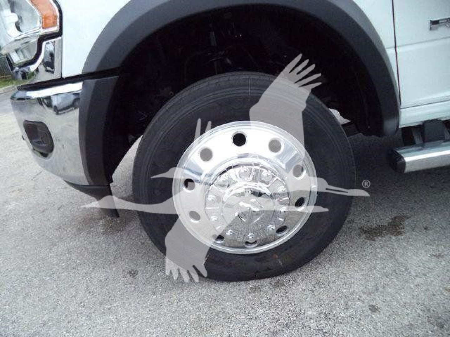Ram 4500 front wheel area showing wheel, tire, and fender of pickup truck