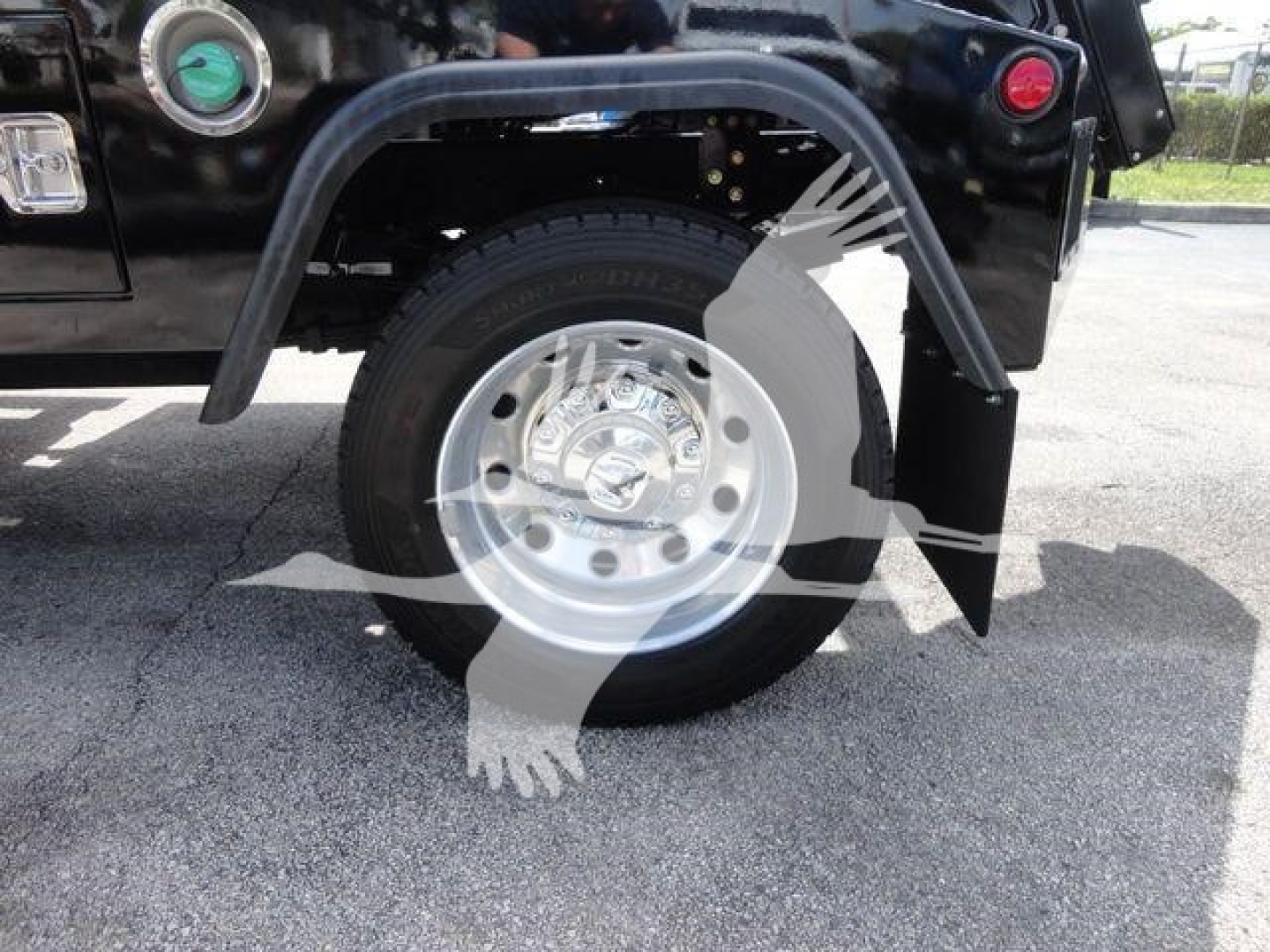 Ram 4500 SLT wheel well and fender showing wheel, tire, and wheel arch; winch category listing context visible.