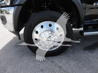 Ram 4500 front wheel showing polished chrome wheel and tire, part of Doyle winch category truck listing.
