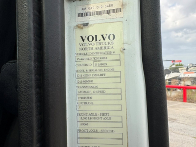 Volvo truck data plate showing VIN, engine, transmission, axles, and specs inside door jamb.