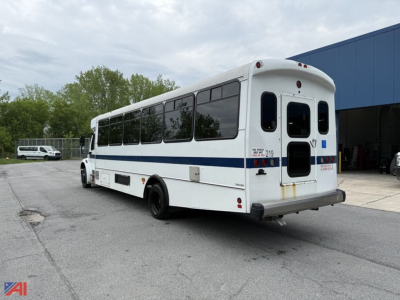 2018 Freightliner S2106 wheelchair bus rear-right view showing back doors and side windows.