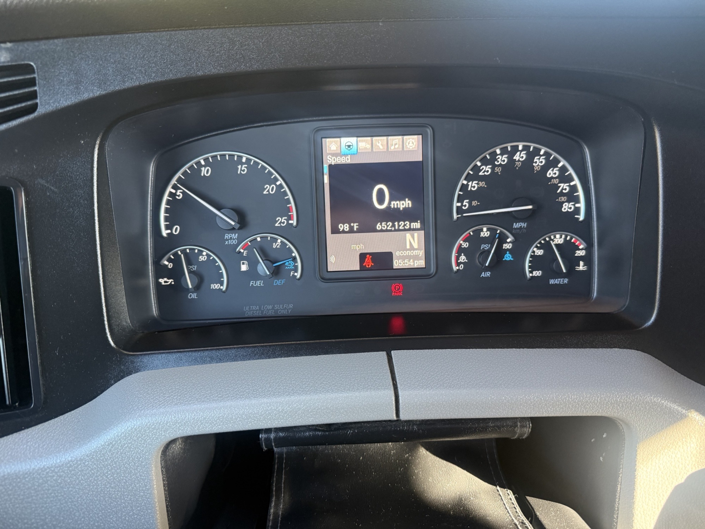 Dashboard display of 2021 Freightliner Cascadia126 showing speedometer, tachometer, and digital gauge cluster with 0 mph reading.