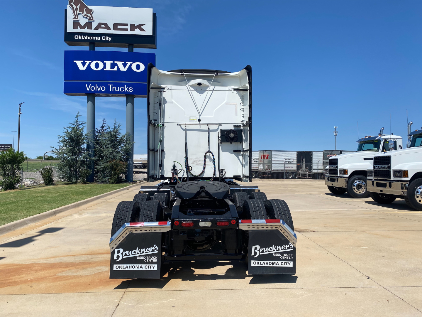 Mack AN64T70 truck tractor rear view showing fifth wheel and rear mud flaps with Bruckner's Oklahoma City text.