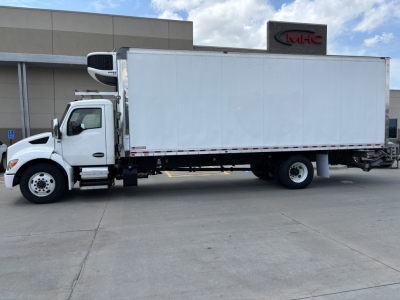 Kenworth T380 refrigerated truck in service showing side view with white box trailer, cab doors, and refrigeration unit, VIN 2NK4HM7X8RM266515, stock 0627699.