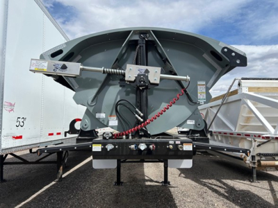 Front view of 2026 Smithco Air Ride Side Dump trailer showing hydraulic lift mechanism and rear support frame.