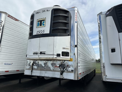 Trailer rear view showing TT refrigerated unit on Utility 3000R trailer with ID 1505 and various stickers, front corners, and door seals.