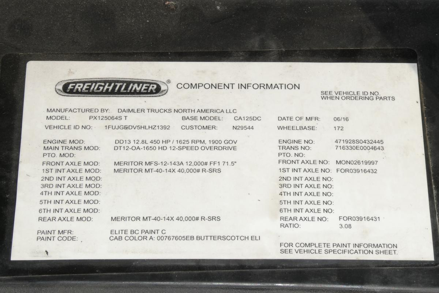 Freightliner component information plate on a 2017 Cascadia 125; shows VIN 1FUJGEDV5HLHZ1392, engine/factory data, paint code, and part numbers.