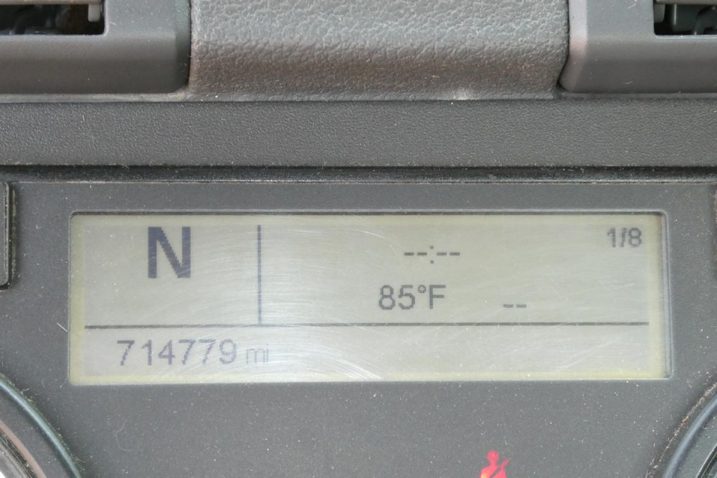 Vehicle instrument cluster display showing N gear, 85°F ambient, 714779 miles.