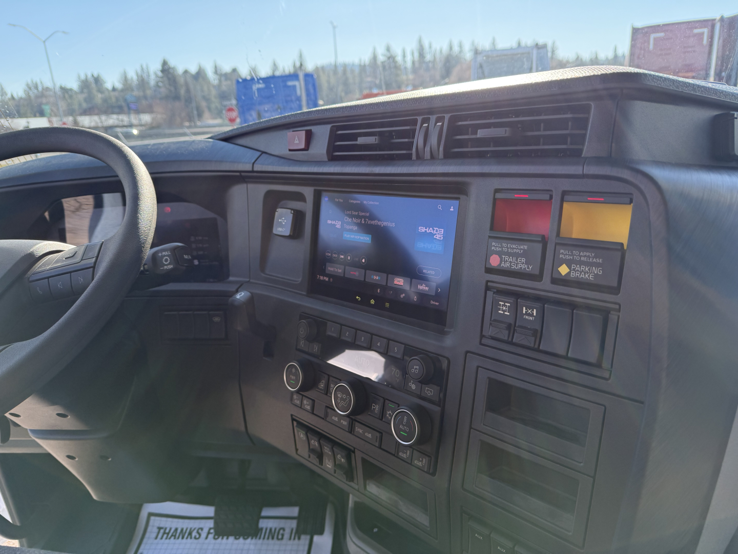 Volvo VNL cabin dashboard and center touchscreen with control panels and vents