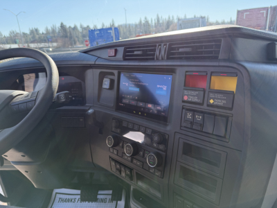 Volvo VNL cabin dashboard and center touchscreen with control panels and vents
