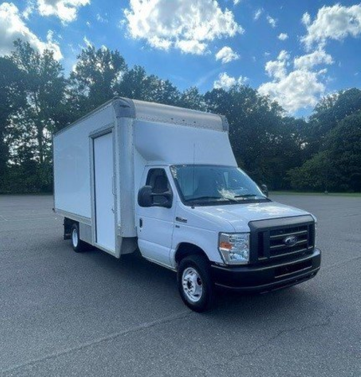 Ford E-Series Cutaway cab chassis truck in white, front three-quarter view with box rear, no visible branding beyond Ford grille.