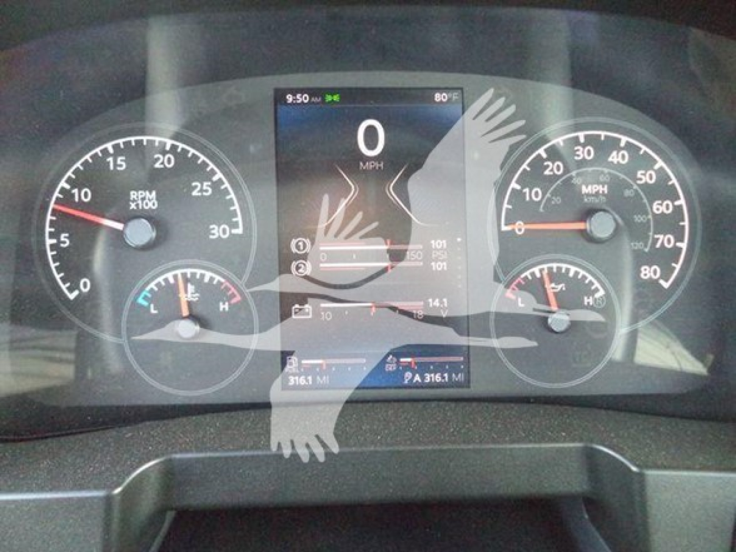 Dashboard of a 2025 Kenworth T280 showing digital speedometer at 0 MPH, analog gauges for RPM and speed, with VIN and stock number notations, and center touchscreen display.
