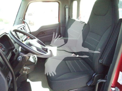 Kenworth T280 truck cab interior showing driver seat and steering wheel with dashboard; no visible text or labels readable in the cab area.