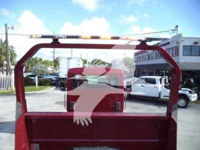 Kenworth T280 rollback truck rear view with a top light bar and hydraulic lift, VIN 2NK3HM6X8SM140819, stock J40819 visible in listing context.