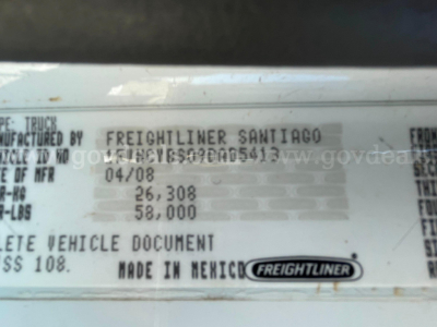 Label with VIN and manufacturing data on a Freightliner cab chassis. Text includes MADE IN MEXICO, FREIGHTLINER logo, and numbers such as 04/08.