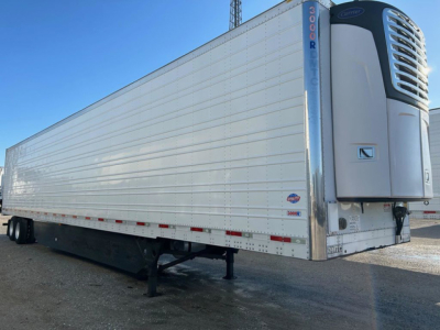 Utility reefer trailer with front refrigeration unit showing 3000R and trailer body.