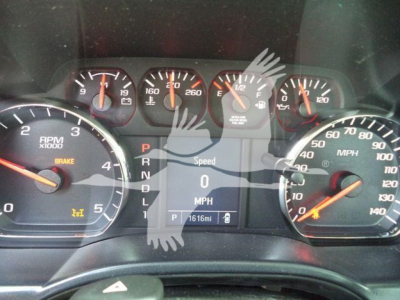 Dashboard of a 2023 International CV rollback truck showing RPM gauge, speedometer, and digital display with gear indicator and odometer reading 1616 mi.