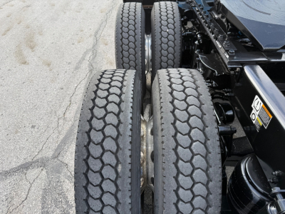 Kenworth T680 truck rear dual-axle wheels with tread pattern visible and part of chassis