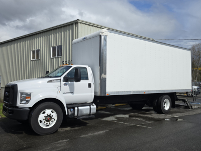 Ford 2019 F650 box truck in white, side view showing cab and large box body mounted on dual rear wheels