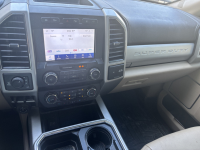 Ford F-350 Super Duty interior dashboard and center stack with touchscreen display and climate controls.