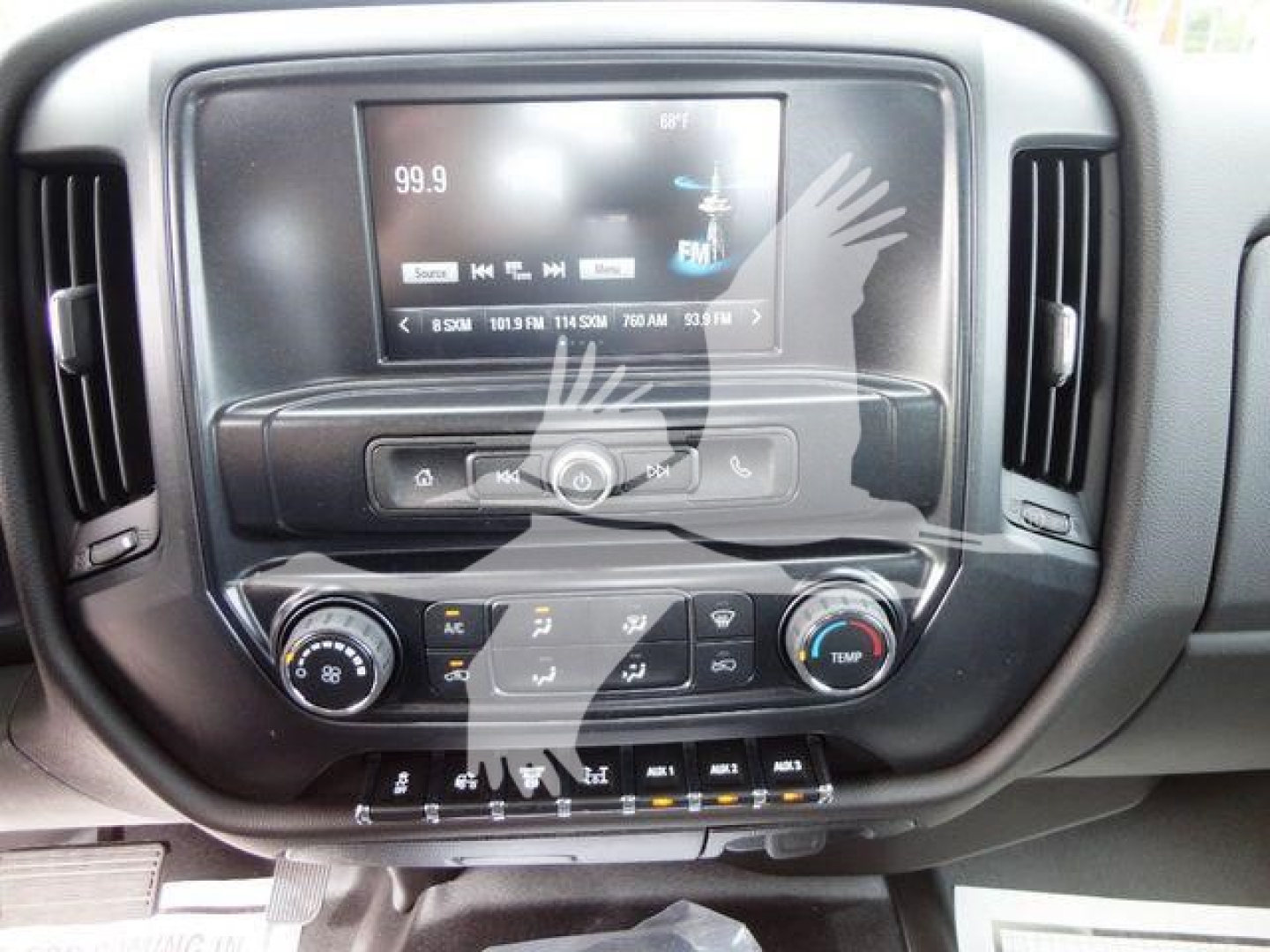 Dashboard area of a 2023 International CV truck showing infotainment screen and climate controls.
