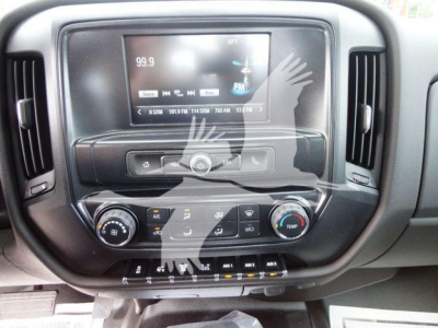 Dashboard area of a 2023 International CV truck showing infotainment screen and climate controls.