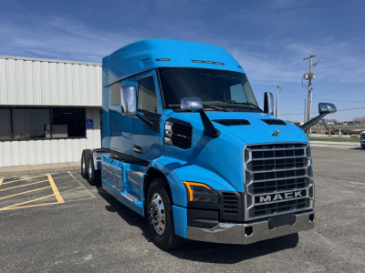 Mack AN64T64 truck in blue, front three-quarter view showing cab and grille