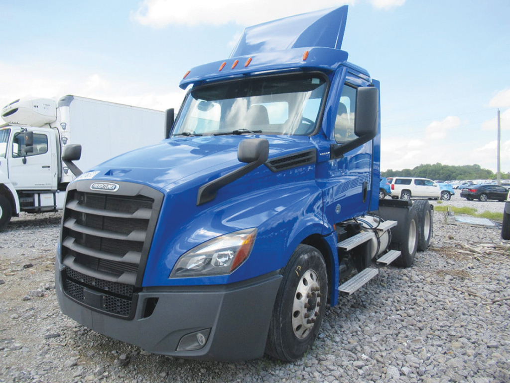Freightliner Cascadia126 truck in blue, front-left view, with black grille, headlights, and side steps. No visible text other than general truck features.