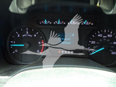 Ford F-550 instrument cluster view with tachometer, speedometer, and digital odometer reading 57,174 miles. Gear indicator PRNDM visible.