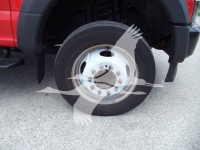 Ford F-550 wheel and tire view in side/front angle.