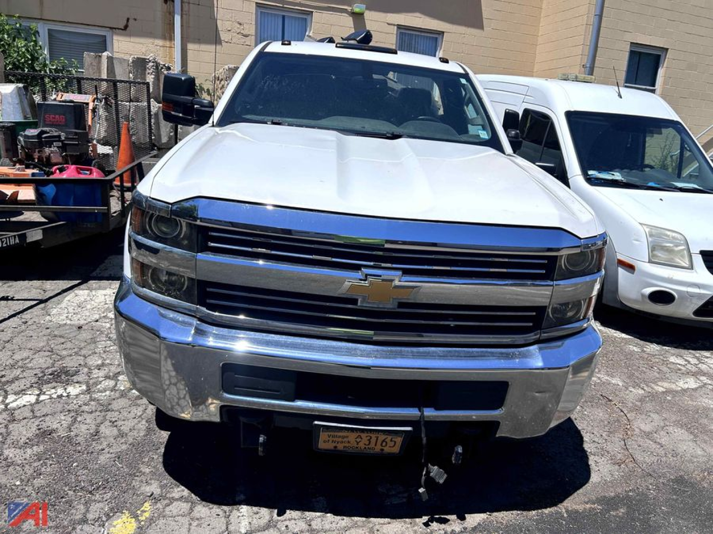 Front view of a 2016 Chevrolet Silverado 3500HD pickup truck, white, chrome grille, Chevrolet bowtie emblem, bumper with license plate area, 4x4 badge not visible.