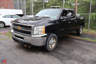 2012 Chevrolet Silverado 2500HD Crew Cab pickup truck in black, front three-quarter view, with chrome grille and bumper, daytime, 4x4