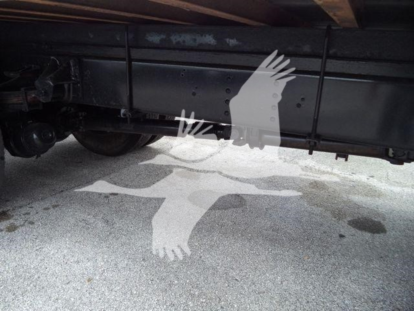 Underbody view of a used 2018 Isuzu FTR truck showing the frame and chassis with no visible fluids labels.