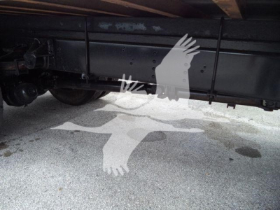 Underbody view of a used 2018 Isuzu FTR truck showing the frame and chassis with no visible fluids labels.