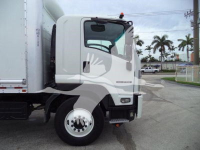 Isuzu FTR box truck cab profile showing front wheel and door area with white paint, no visible text on cab.