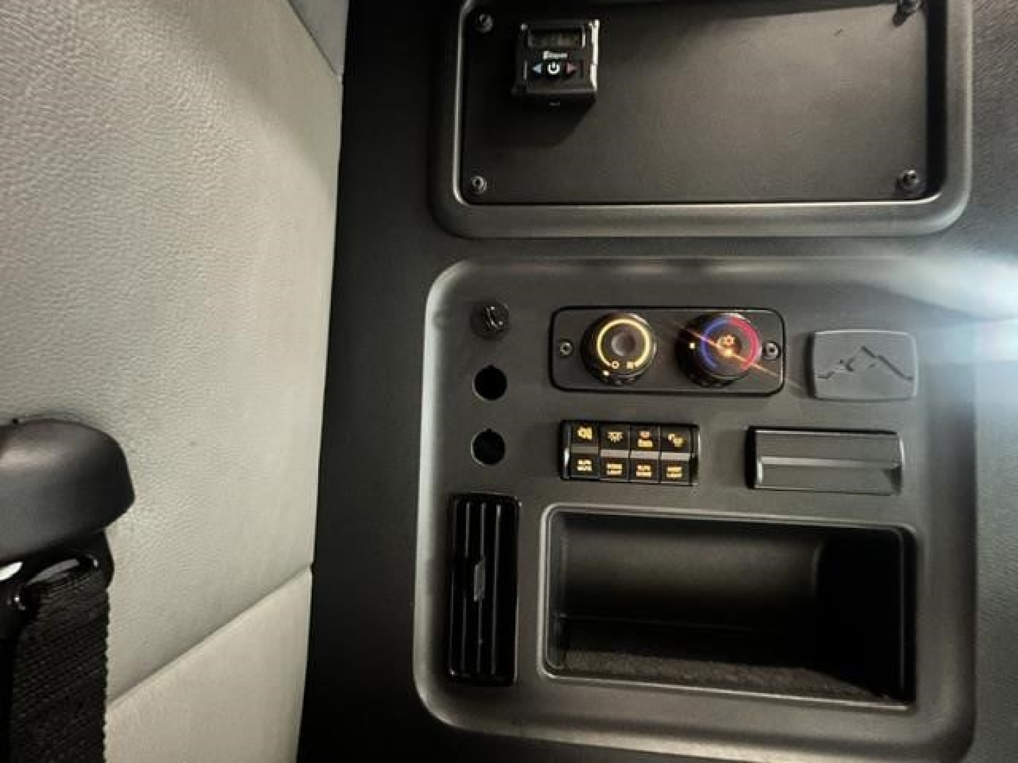 Dashboard area of a 2022 Freightliner Cascadia 126 sleeper cab showing instrument panel, gauges, and compartments.