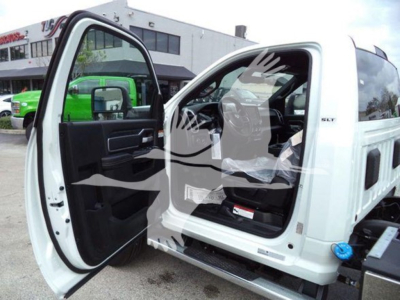 Ram 5500 SLT crew cab with front door open, white body, interior seating visible