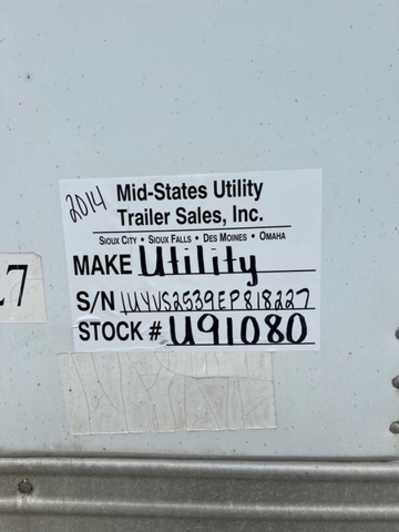 Tag on trailer showing 2014 Mid-States Utility Trailer Sales, Inc. Make Utility, S/N 1UYVS2539EP818227, Stock # U91080, VIN 2014