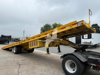 1998 Landoll 330D-1 trailer showing extended lowboy with hydraulic support and landing legs.