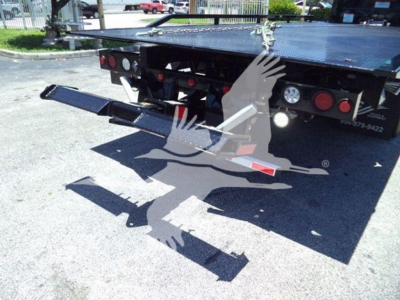 Rear view of a 2026 Hino L6 rollback truck showing bumper hardware and taillights.