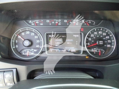 Dashboard of a new 2027 International MV roll-back truck showing instrument cluster and digital display with gauges.