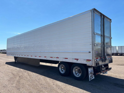 Refrigerated trailer showing side view of a 2021 Utility reefer with tandem axles and a rear door, VIN 1UYVS2533M2382664.