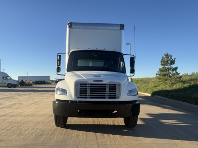 Front view of a 2022 Freightliner M2-106 box truck showing large grille, headlights, bumper, and cargo box.