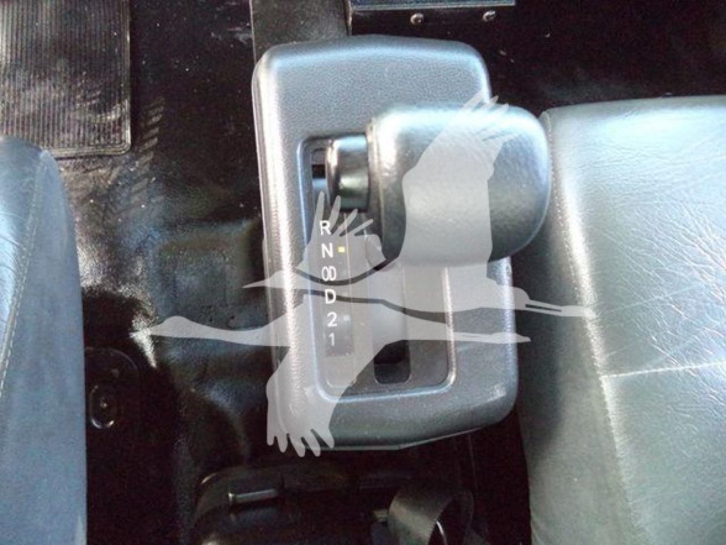 Gear selector panel showing PRND21 gear positions in the cab of a 2019 Hino 338 truck