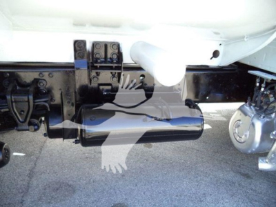 Trucks undercarriage showing fuel tank and frame components from a 2019 Hino 338 side exterior view.