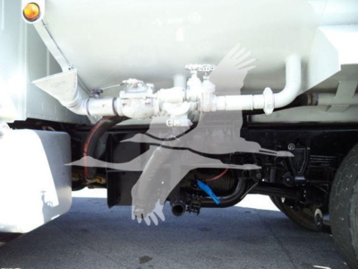 Truck fuel/tuel system undercarriage showing gas/air lines and valves with Hino chassis components.