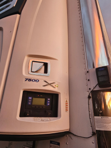 Truck side of Hyundai ThermoTech TL trailer with 7500 X4 label and control panel visible in cab area.